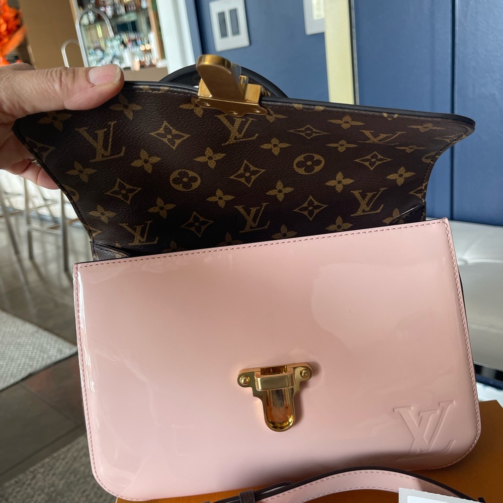 100% authentic Louis Vuitton handbag with a solders strap